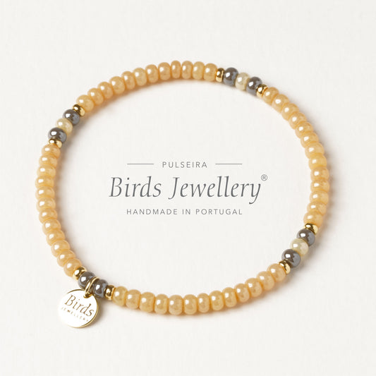 Pulseira Mel & Cinzento Birds Jewellery em contas de cristal boémio e prata 925 dourada, feita à mão em Portugal.