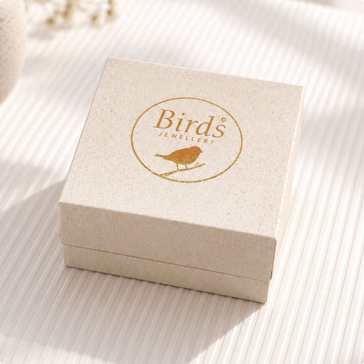 Caixa de oferta Birds Jewellery incluída na compra da pulseira.